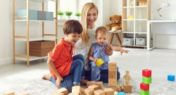 Mom playing with her children