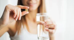Girl taking custom compounding medication