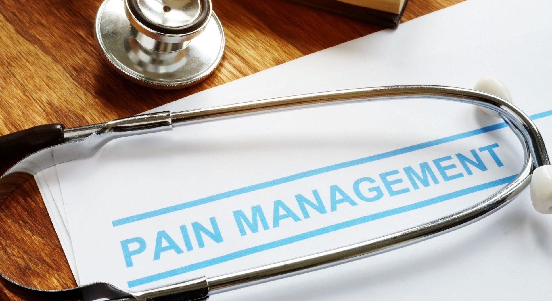 paper with the words pain management written on it